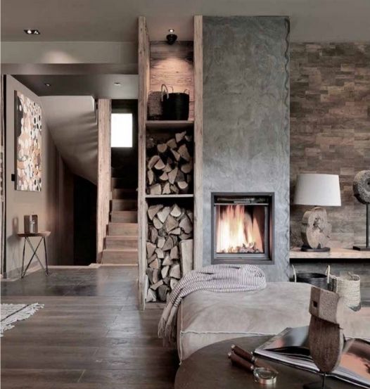 Cheminée du chalet à Megève de 250m2 rénové par l'architecte d'intérieur Sophie Jacquemin Interior Design basée à Genève