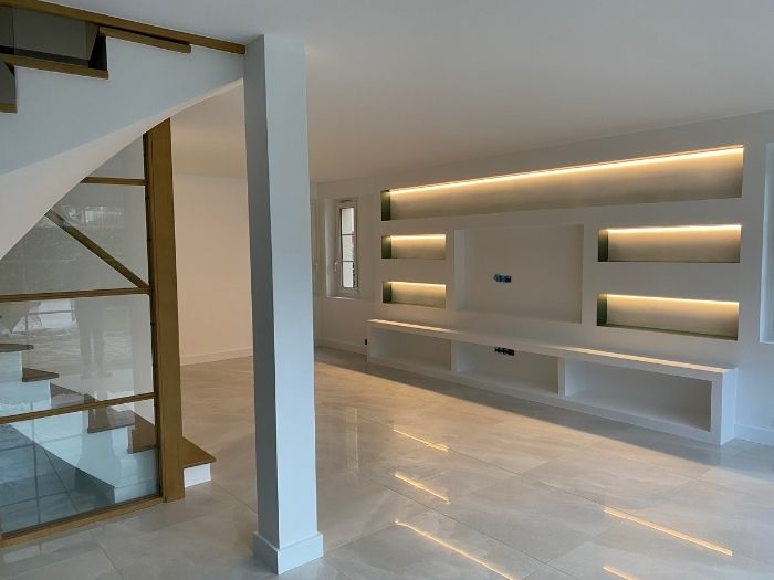 Rénovation d'un salon et d'un escalier dans une maison à Beaumont effectuée par l'architecte d'intérieur Sophie Jacquemin Interior Design